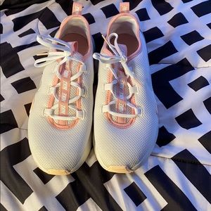 White and Coral Nike shoes